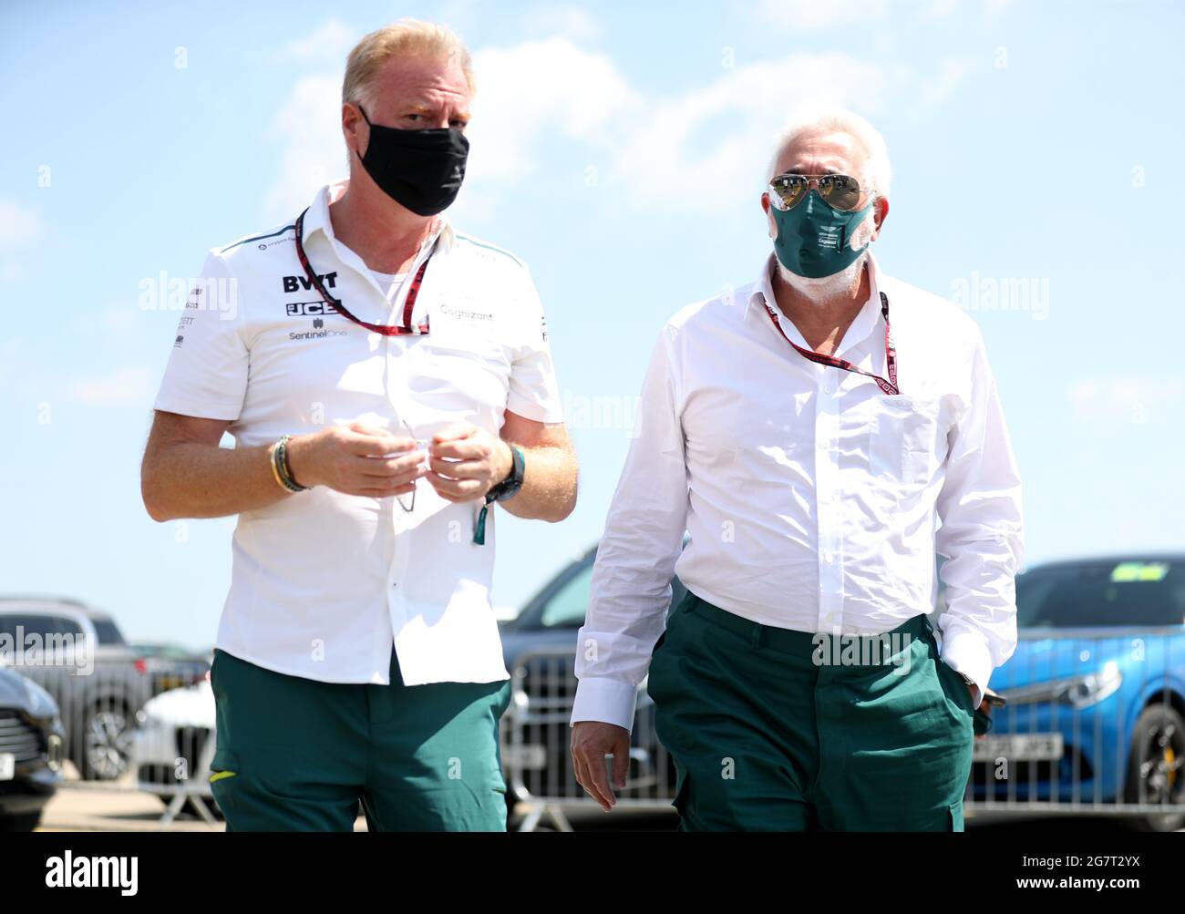Part Owner of Aston Martin F1 Team Lawrence Stroll (right) arrives for practice for the British Grand Prix at Silverstone, Towcester. Picture Date: Friday July 16, 2021. Stock Photo