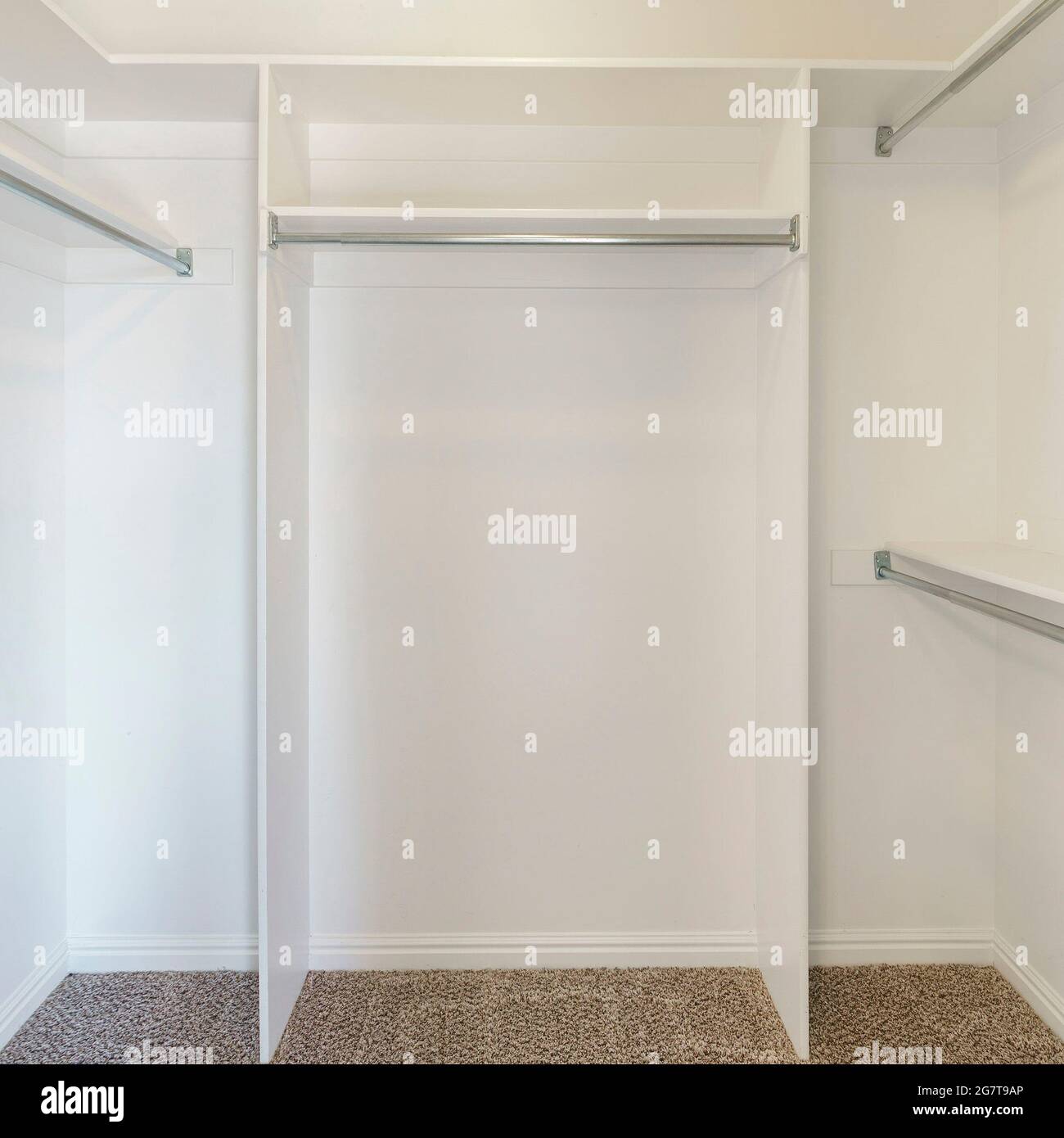 Square frame Inside an empty walk in closet with shelves, hanging rods ...