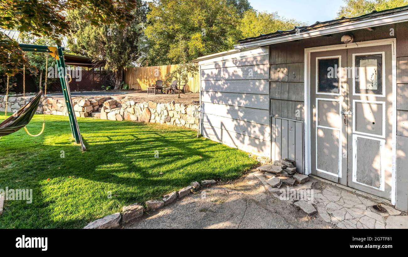 Pano Tool shed at the backyard with cracked concrete flooring at the entrance Stock Photo Alamy