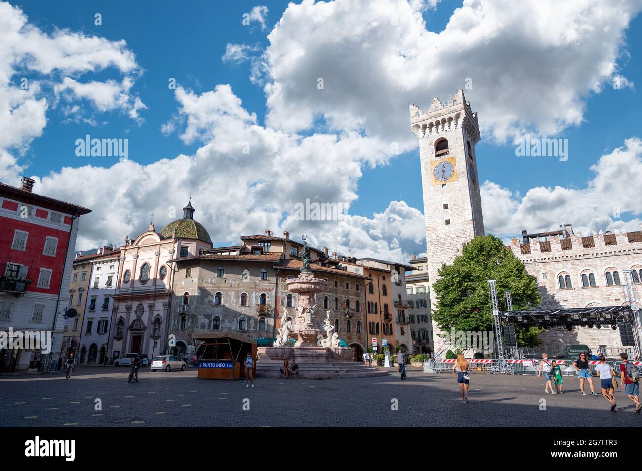 Trento, Italy, June 2021. Nice view of the main square: in evidence the bell tower, the fountain of Neptune and the cathedral. Nice sunny day. Stock Photo