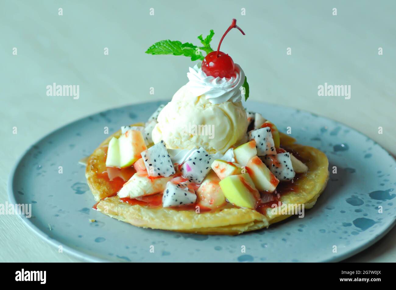 naan or roti, deep fried naan with fruit and ice cream topping Stock