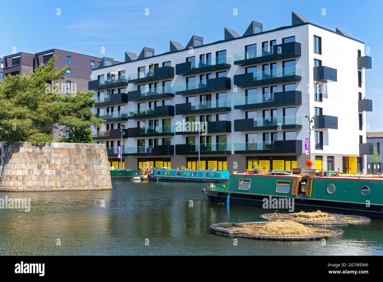 The Mansion House apartment block, from the Cotton Field Park marina