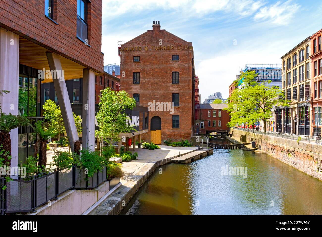 The Rochdale Canal with the Kampus development at left and Canal Street at right.   Manchester, England, UK Stock Photo