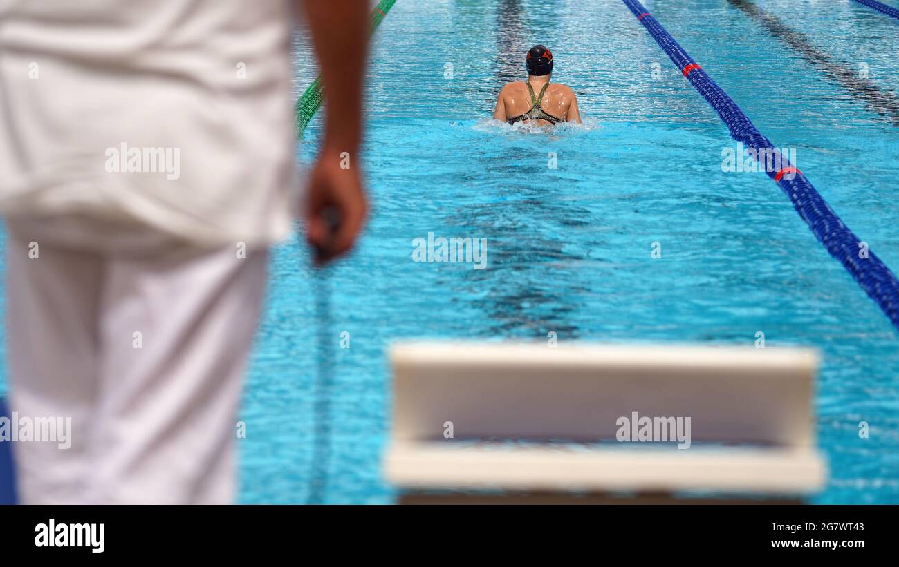 Young female swimming laps in a swimming pool Stock Photo Alamy Young female swimming laps in a swimming pool Stock Photo Alamy