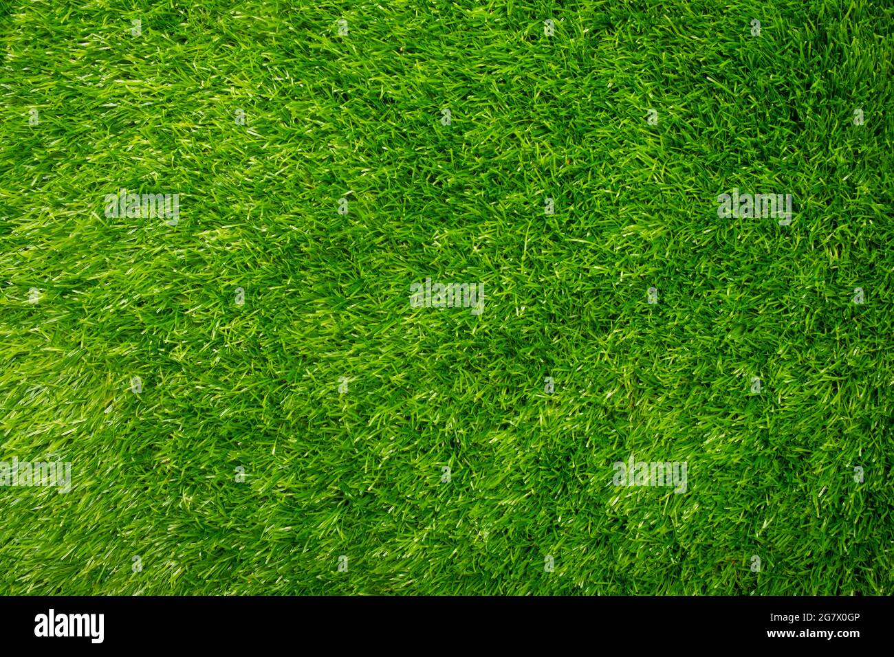 artificial green grass texture background Stock Photo - Alamy