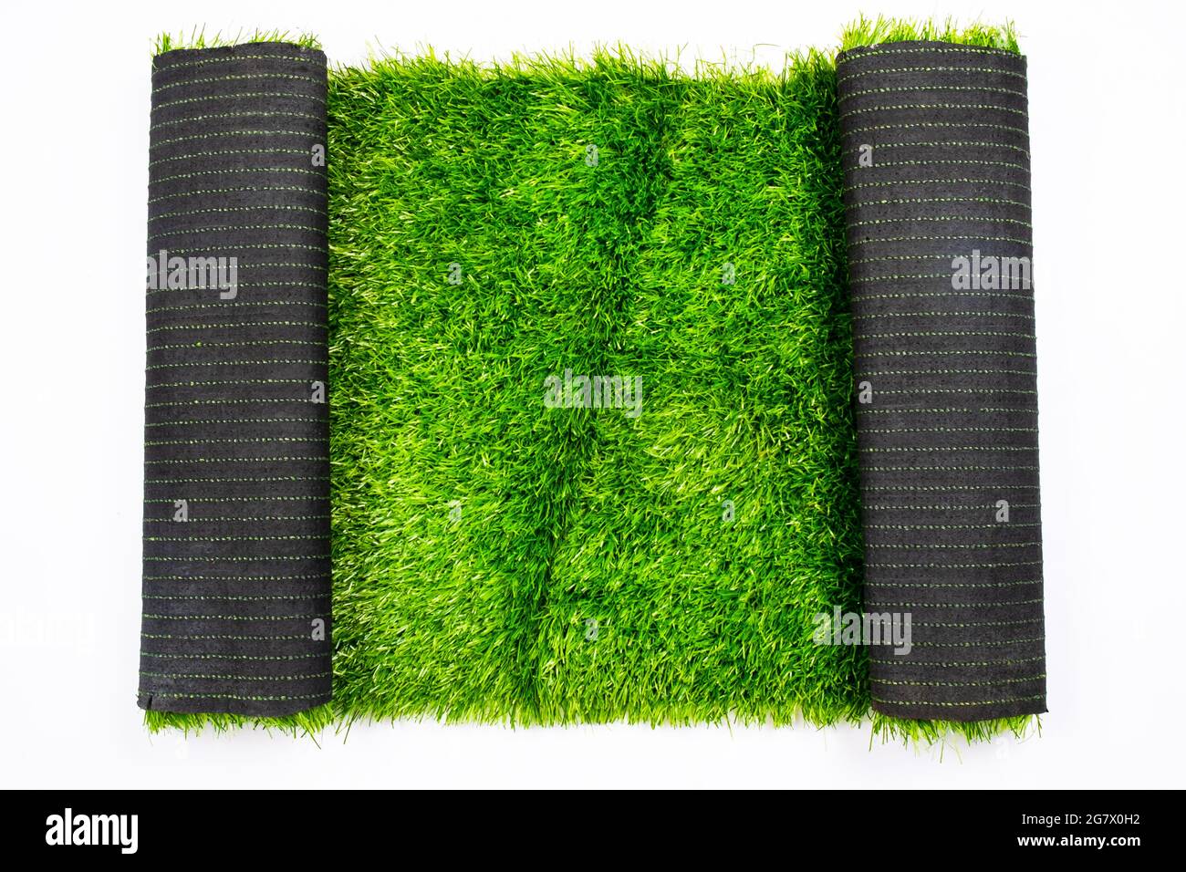 roll of artificial green grass isolated on white background, lawn