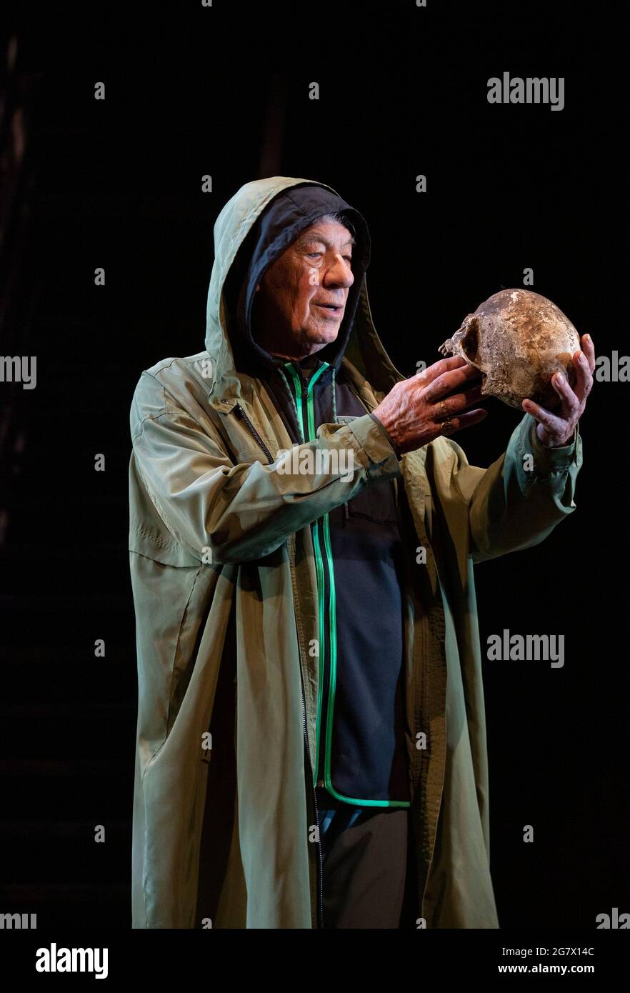 Ian McKellen as Hamlet with the skull of Yorick in HAMLET by Shakespeare opening at the Theatre Royal Windsor, England on 20/07/2021 set design: Lee Newby  costumes: Loren Epstein  wigs & make-up: Susanna Peretz  lighting: Zoe Spurr  director: Sean Mathias Stock Photo