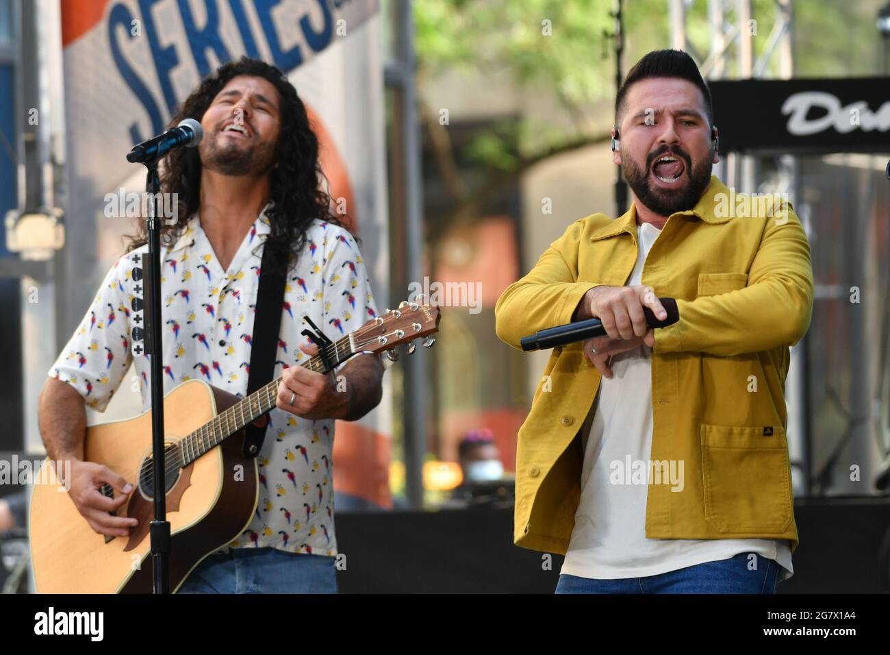 Dan Smyers and Shay Mooney of Dan + Shay perform on 'Today' Show at Rockefeller Plaza on July 16, 2021 in New York. Stock Photo