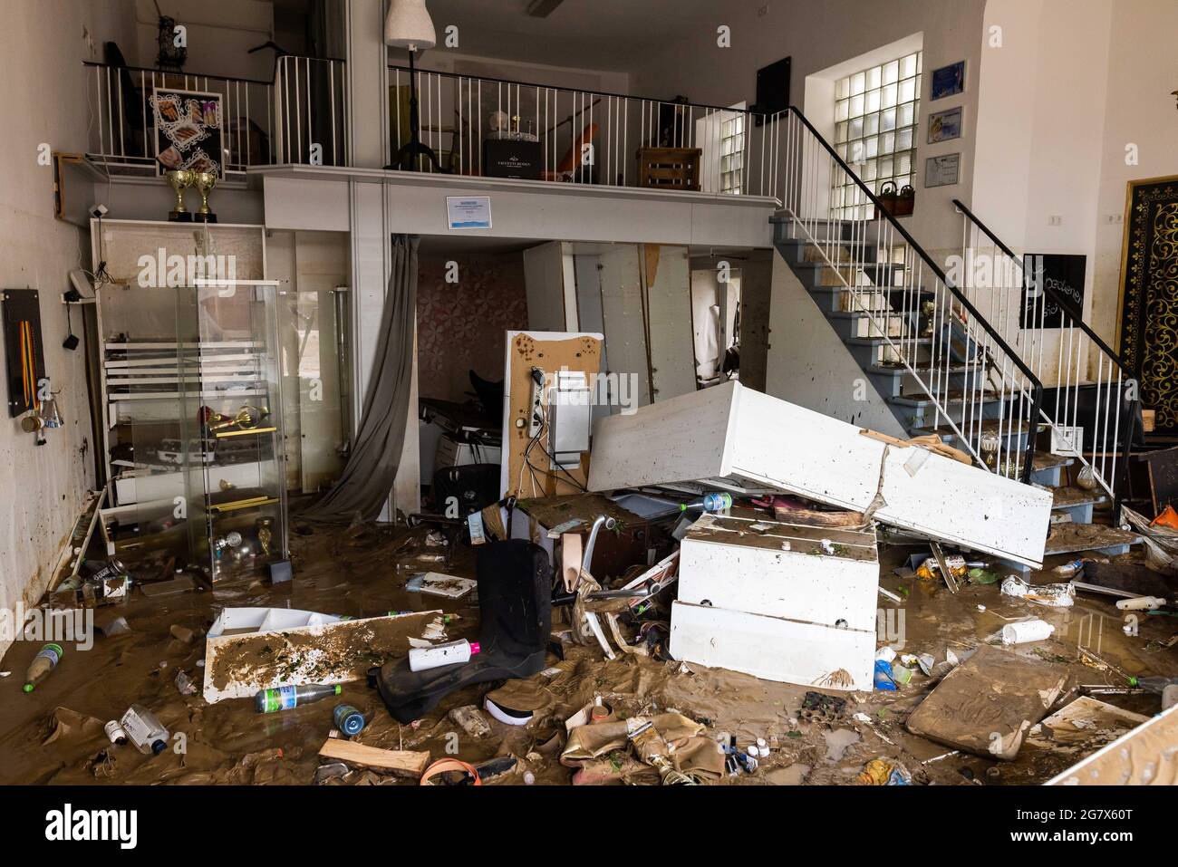 Bad Neuenahr, Germany. 16th July, 2021. The completely destroyed interior is in a fashion store. Massive rainfall has caused flooding in Bad Neuenahr in Rhineland-Palatinate as well as in the entire district of Ahrweiler. Credit: Philipp von Ditfurth/dpa/Alamy Live News Stock Photo