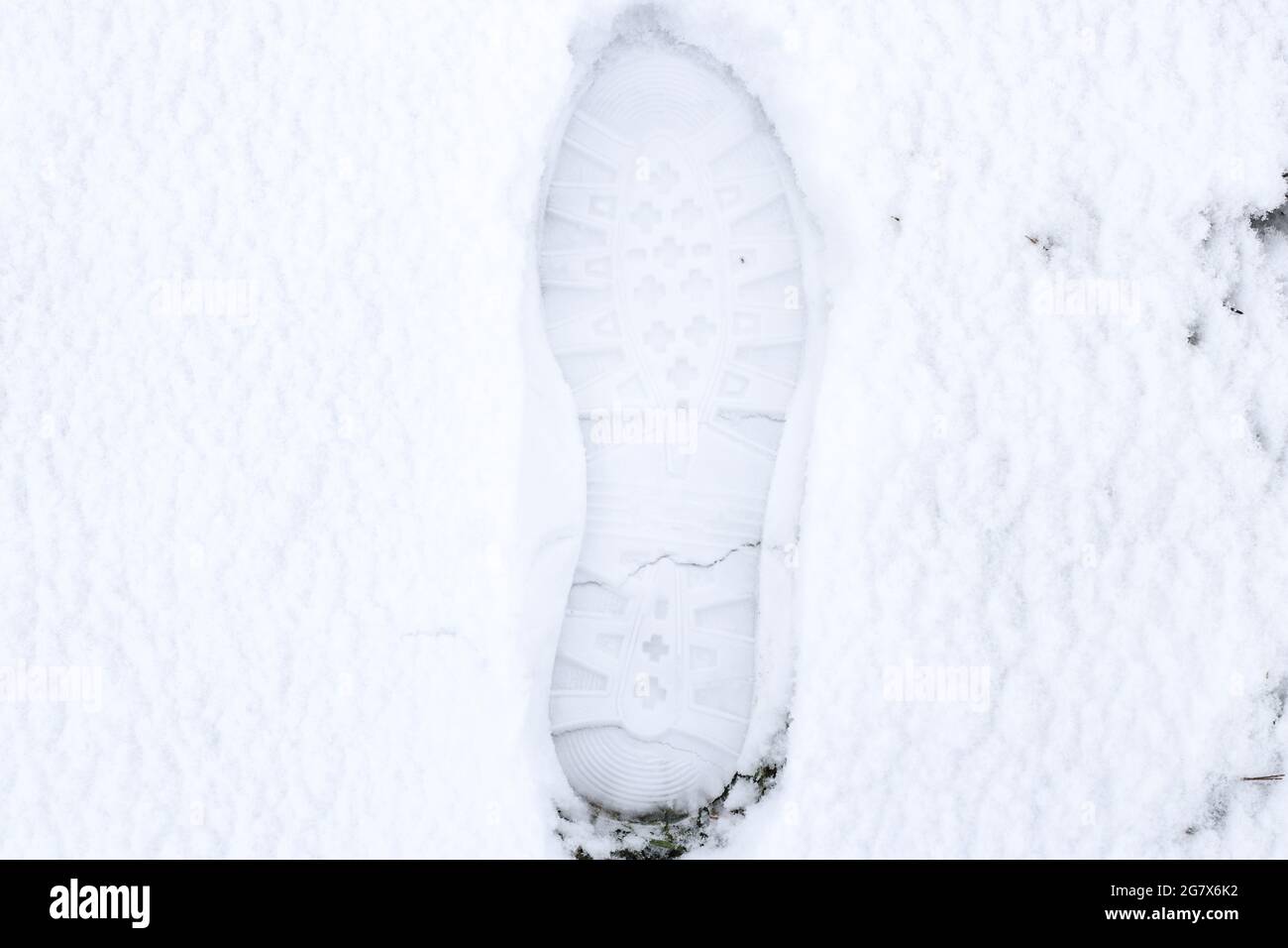High Angle View of footprint on snow in winter day Stock Photo