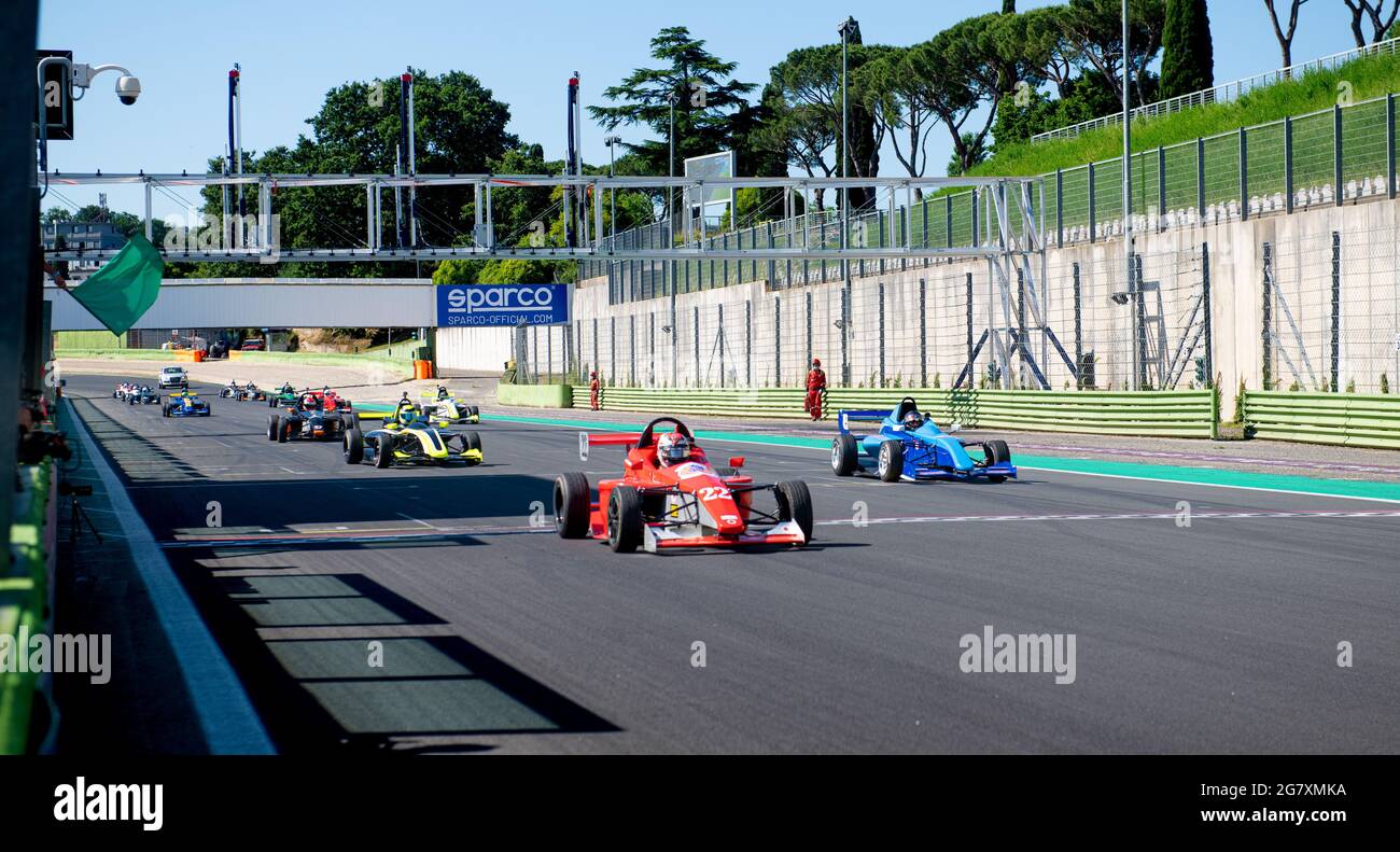 Vallelunga June 13 2021, Fx series racing. Green flag on starting line straight asphalt track group of formula racing cars Stock Photo