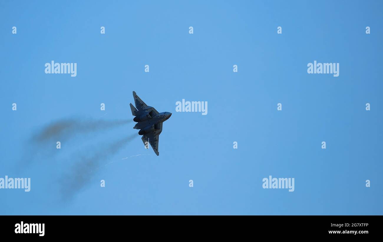 New Russian five generation fighter SU 57, T-50 shows aerial maneuver battle at Moscow International Aviation and Space Salon MAKS 2019. RUSSIA Stock Photo