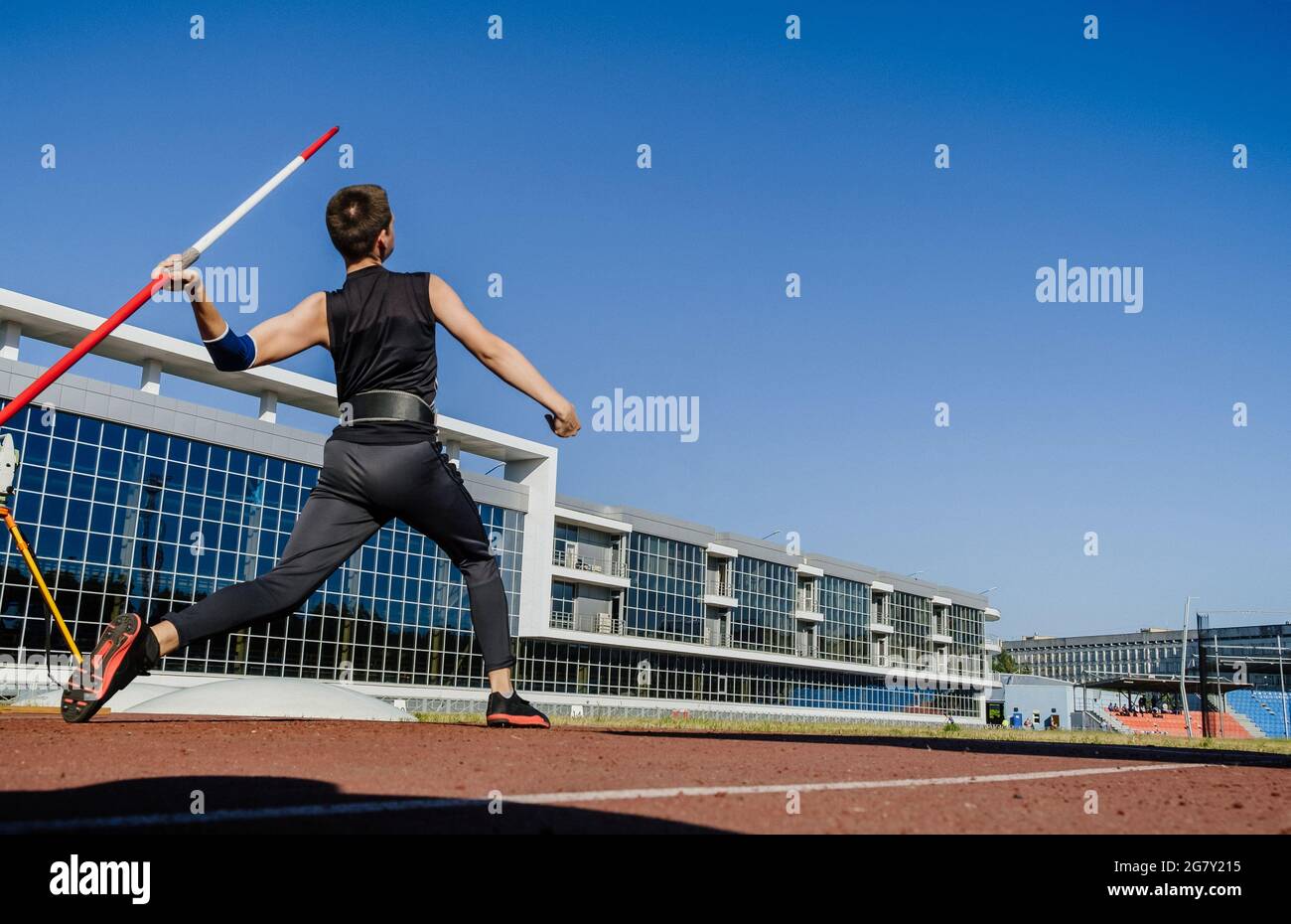 male athlete javelin throw at track and field competition Stock Photo