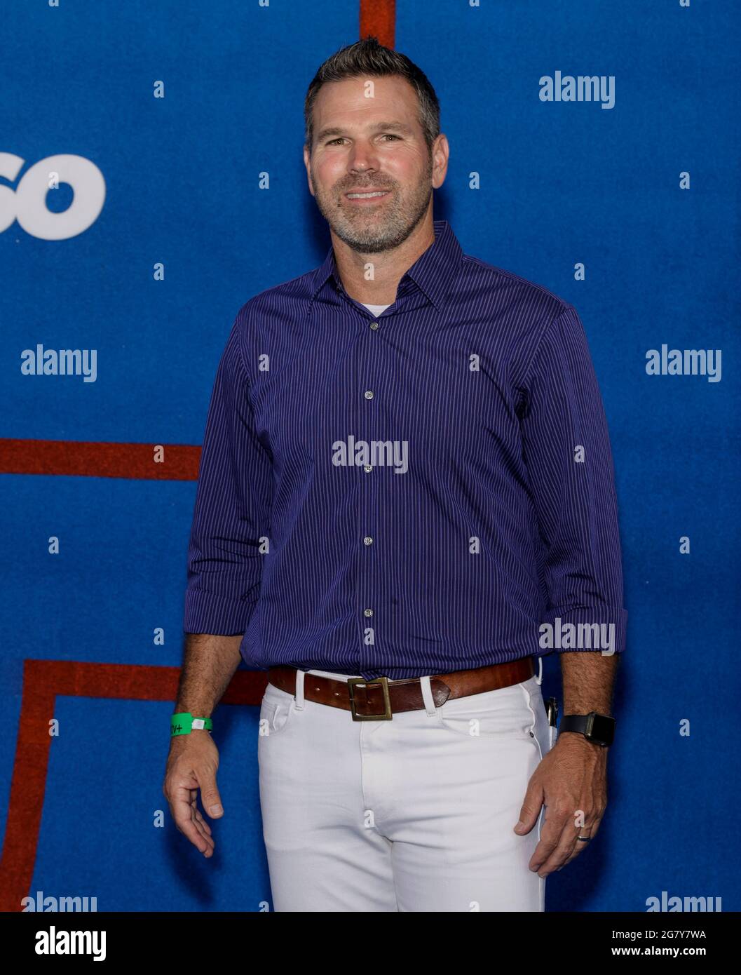WEST HOLLYWOOD, CALIFORNIA - JULY 15, 2021: US former soccer player and LA Galaxy Greg Vanney (C) attends Apple's 'Ted Lasso' Season 2 Premiere at Pac Stock Photo