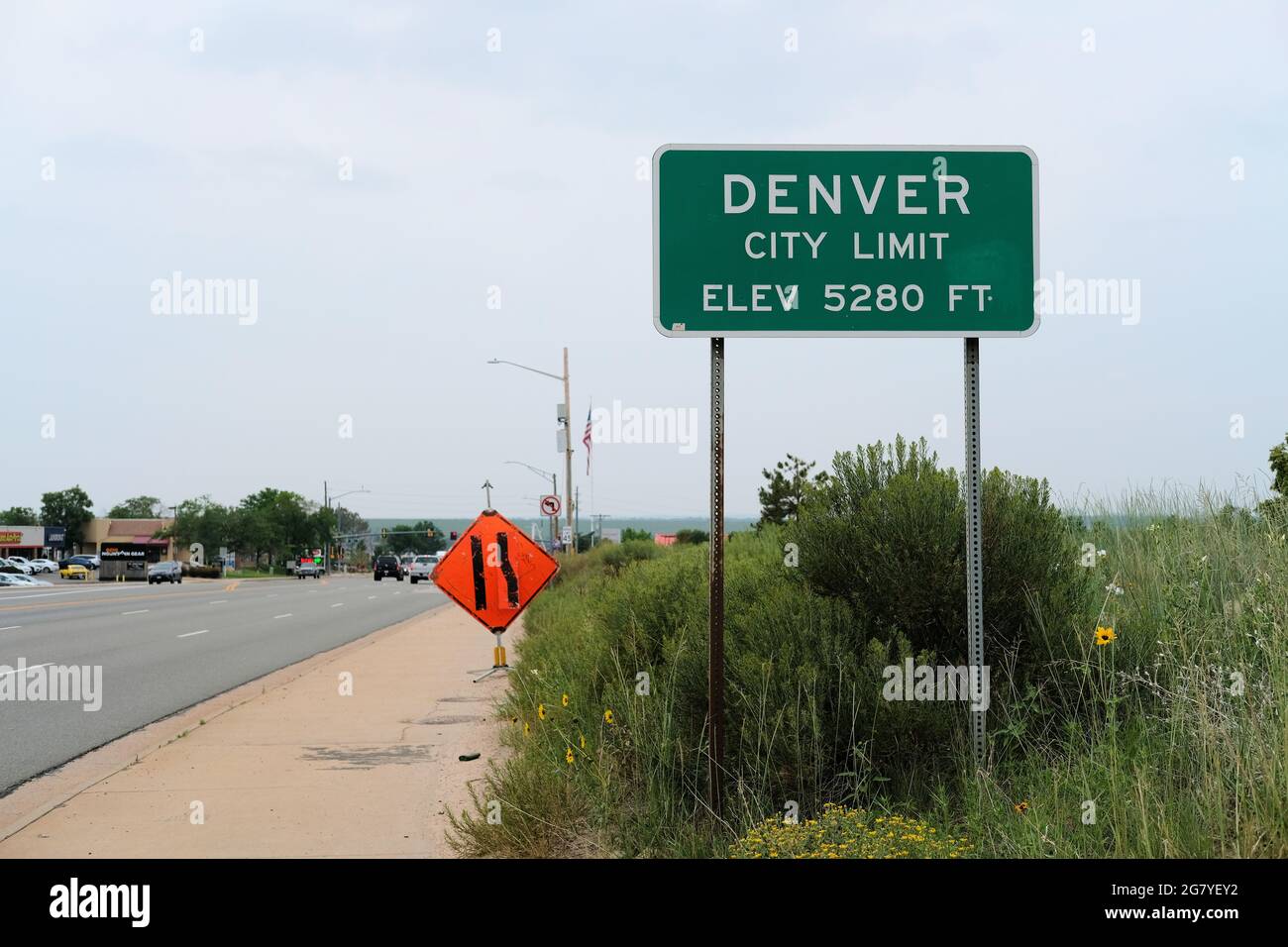 City limit street sign where Aurora, Colorado meets Denver informing visitors of the Mile High City's 5280 foot elevation, one mile above sea level. Stock Photo