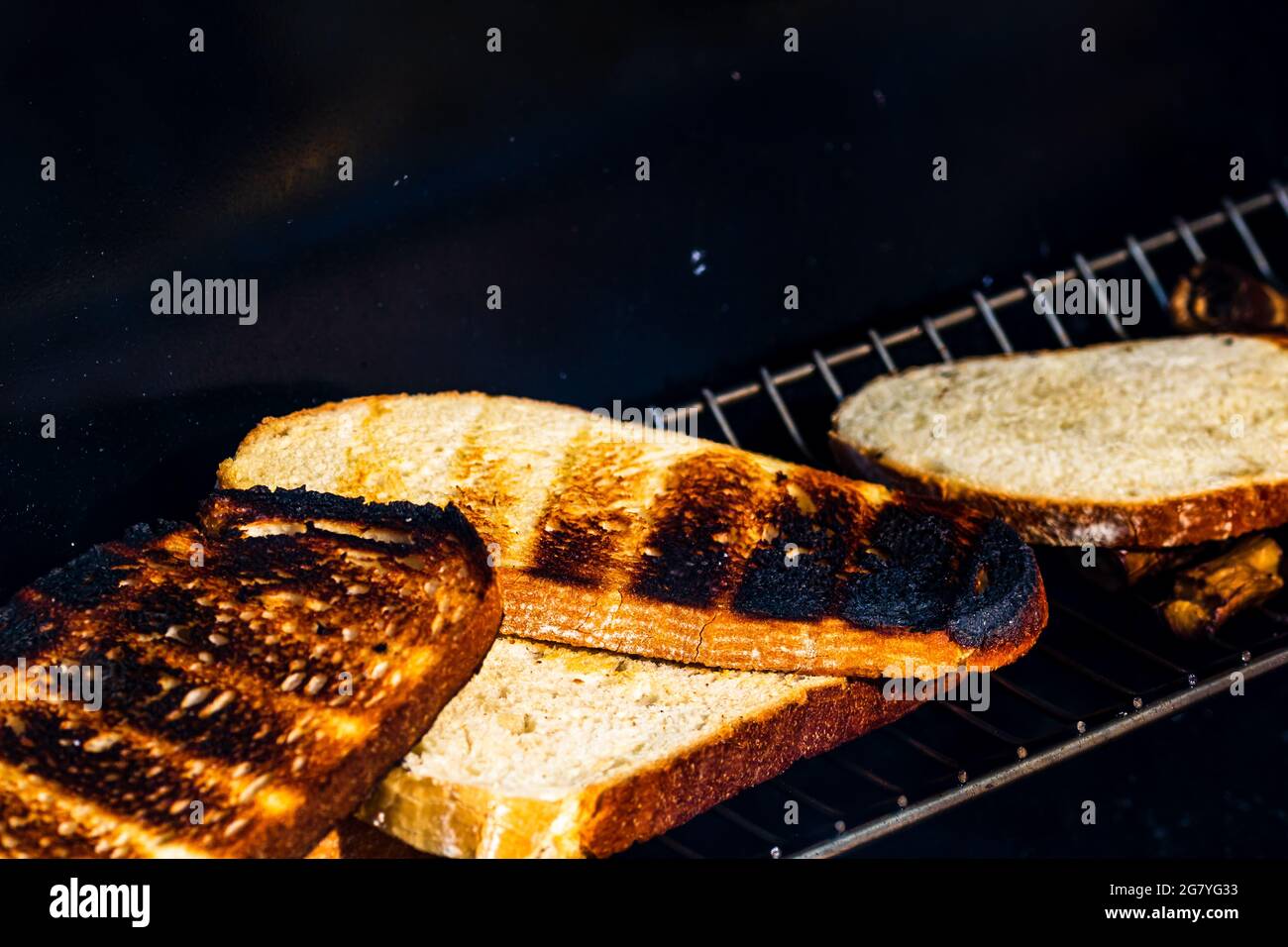 Tasty fresh bread being baked on charcoal grill Stock Photo Alamy
