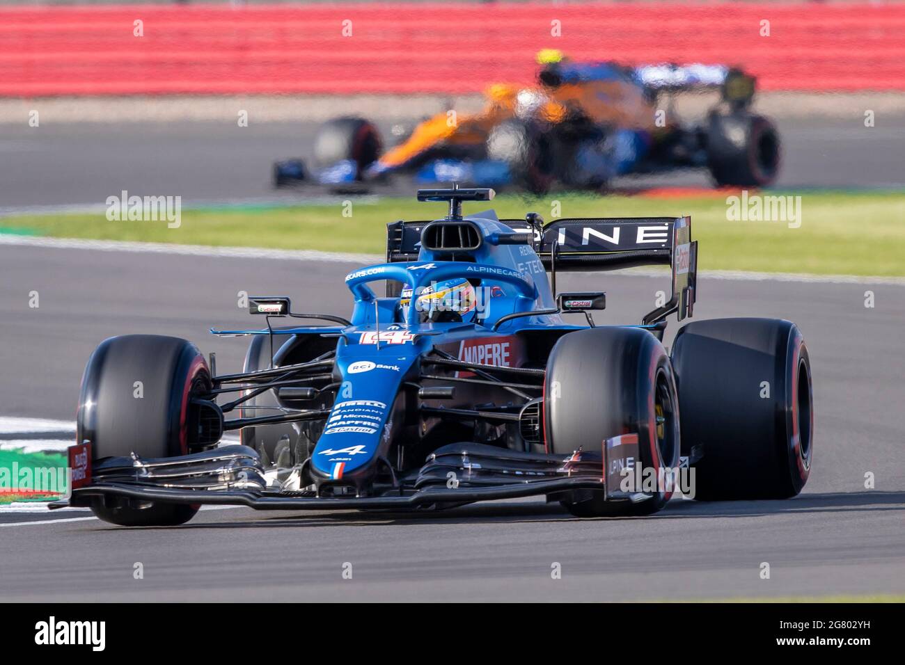 Silverstone Northamptonshire Uk 16th July 21 Formula One British Grand Prix And Qualifying Alpine F1 Team Driver Fernando Alonso In His Alpine A521 Renault E Tech b Ahead Of Mclaren F1 Team Driver Silverstone Northamptonshire Uk 16th July 21 Formula One British Grand Prix And Qualifying Alpine F1 Team Driver Fernando Alonso In His Alpine A521 Renault E Tech b Ahead Of Mclaren F1 Team Driver