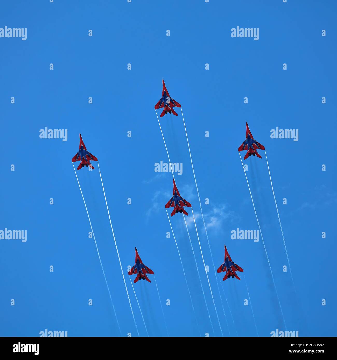 Airshow of the aerobatic team Strizhi - The Swifts. Aerobatic Team on ...