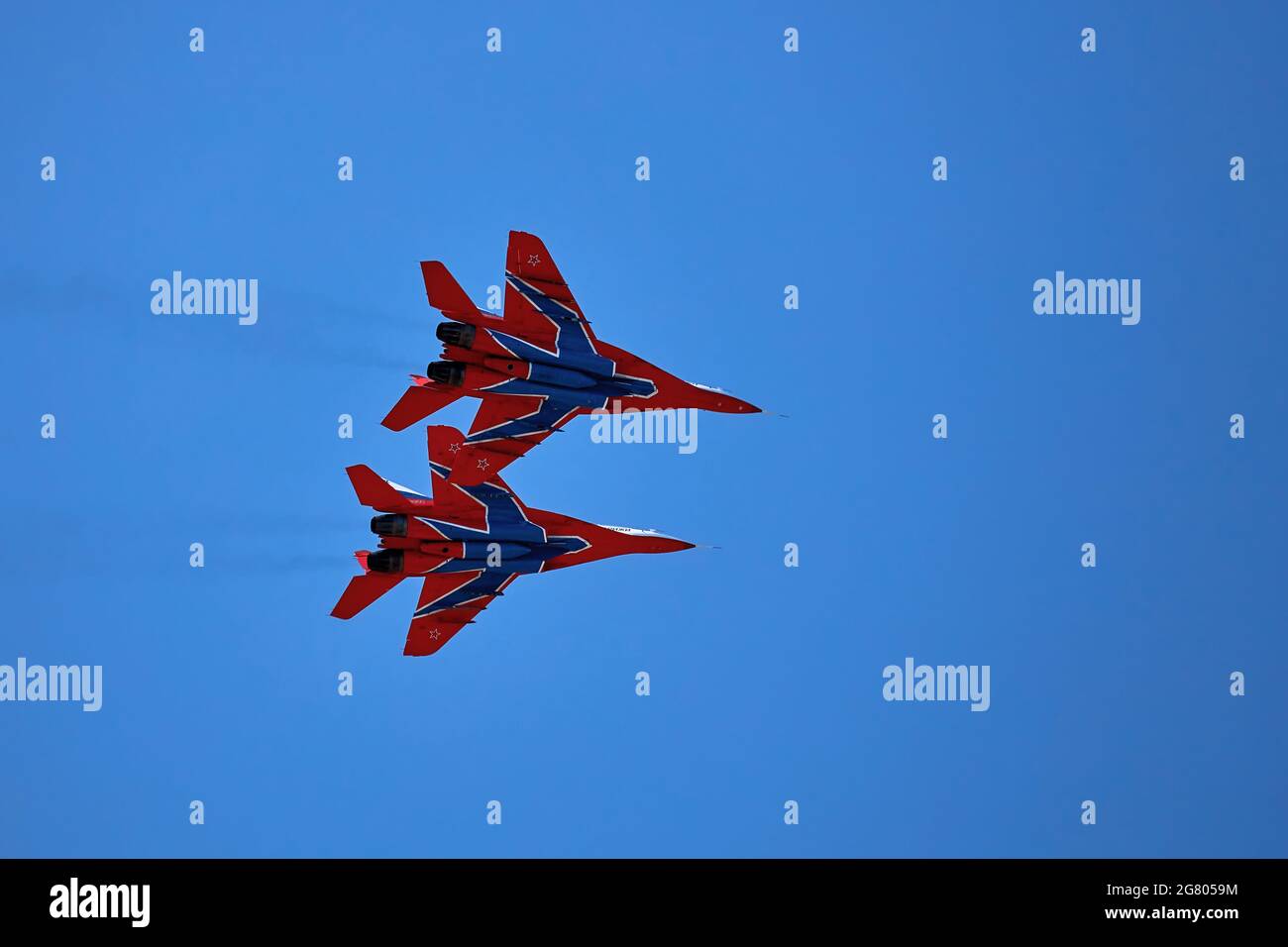 Airshow of the aerobatic team Strizhi - The Swifts. Aerobatic Team on ...