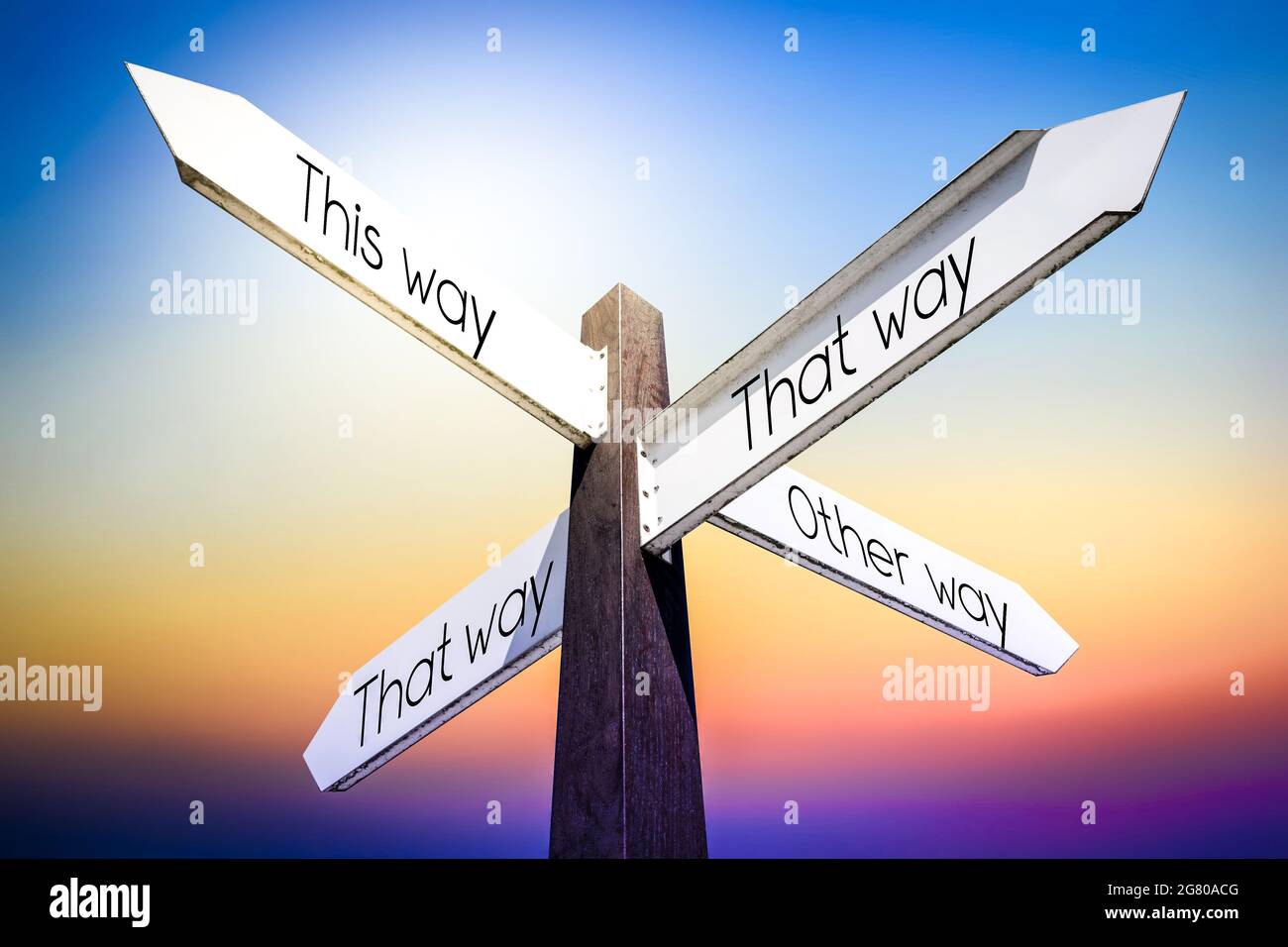 Four way directional arrows hi-res stock photography and images - Alamy