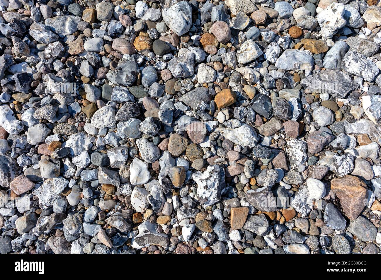 flints at Baltic Sea beach for background use Stock Photo