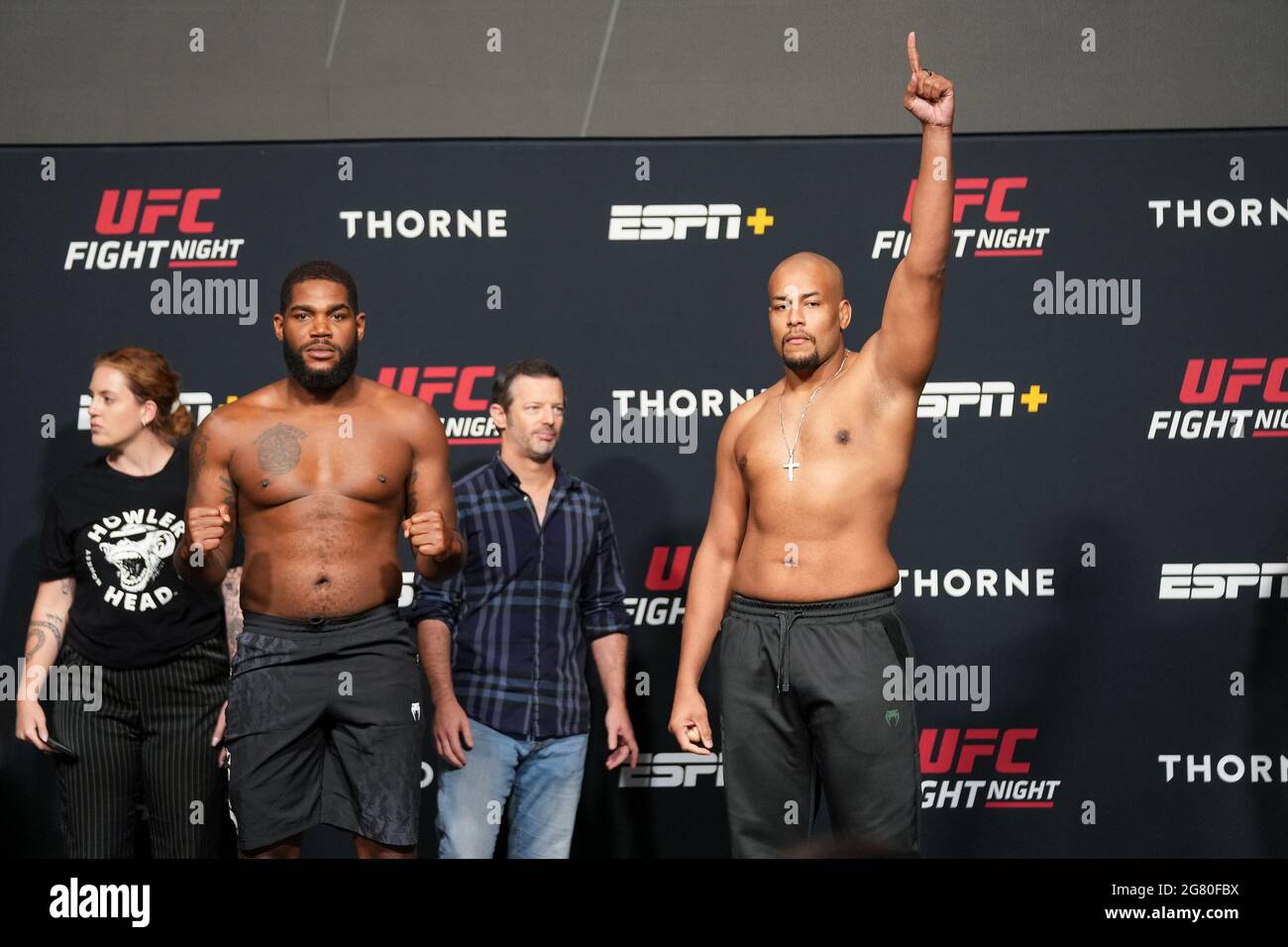 Las Vegas, USA. 16th July, 2021. Alan Baudot (left) and Rodrigo Nascimento (right)face-off following the official weigh-in during UFC Fight Night - Vegas 31 ESPN - Face-off at UFC APEX on July 16, 2021 in Las Vegas, NV, United States. (Photo by Louis Grasse/PxImages) Credit: Px Images/Alamy Live News Stock Photo