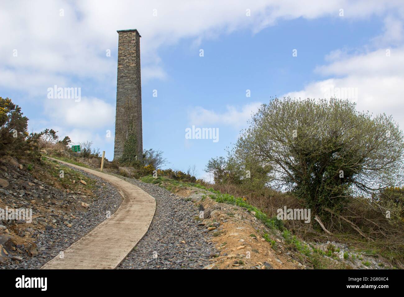 An old industrial chimney from the 19th century South Engine House at the derelict lead mines workings in Conlig in County Down, Northern Ireland Stock Photo