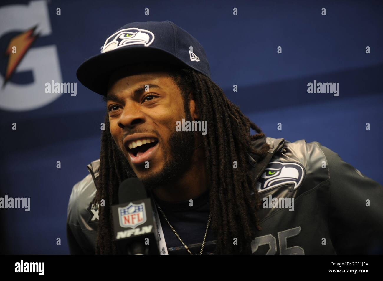 Newark, United States Of America. 28th Jan, 2014. NEWARK, NJ - JANUARY 28: Richard Sherman speaks to the media during Super Bowl XLVIII Media Day at the Prudential Center on January 28, 2014 in Newark, New Jersey. Super Bowl XLVIII will be played between the Seattle Seahawks and the Denver Broncos on February 2. in Newark New Jersey People: Richard Sherman Credit: Storms Media Group/Alamy Live News Stock Photo