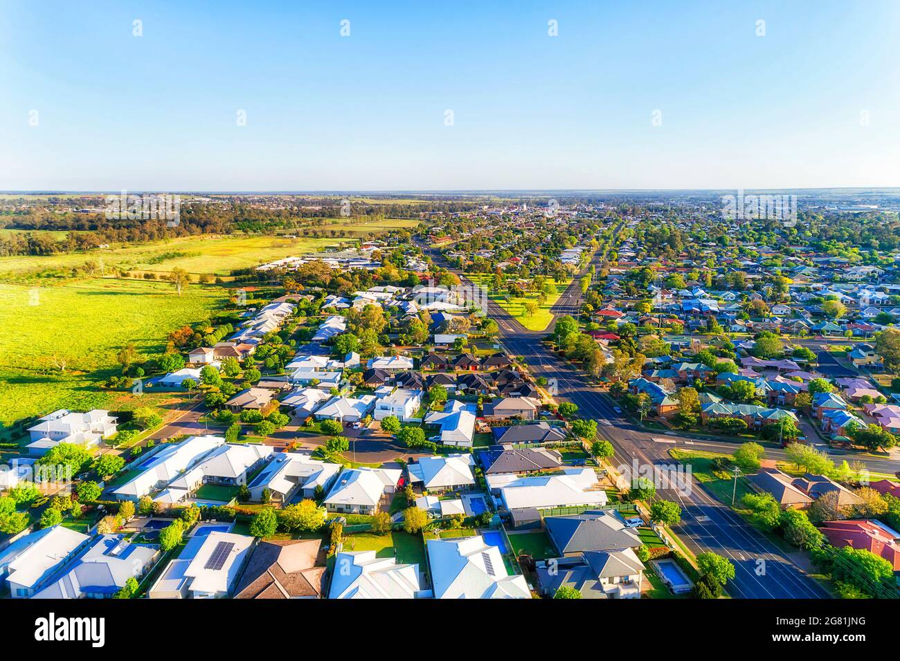 Great western plains of Australia - Dubbo town streets and residential suburbs in aerial scenic view. Stock Photo