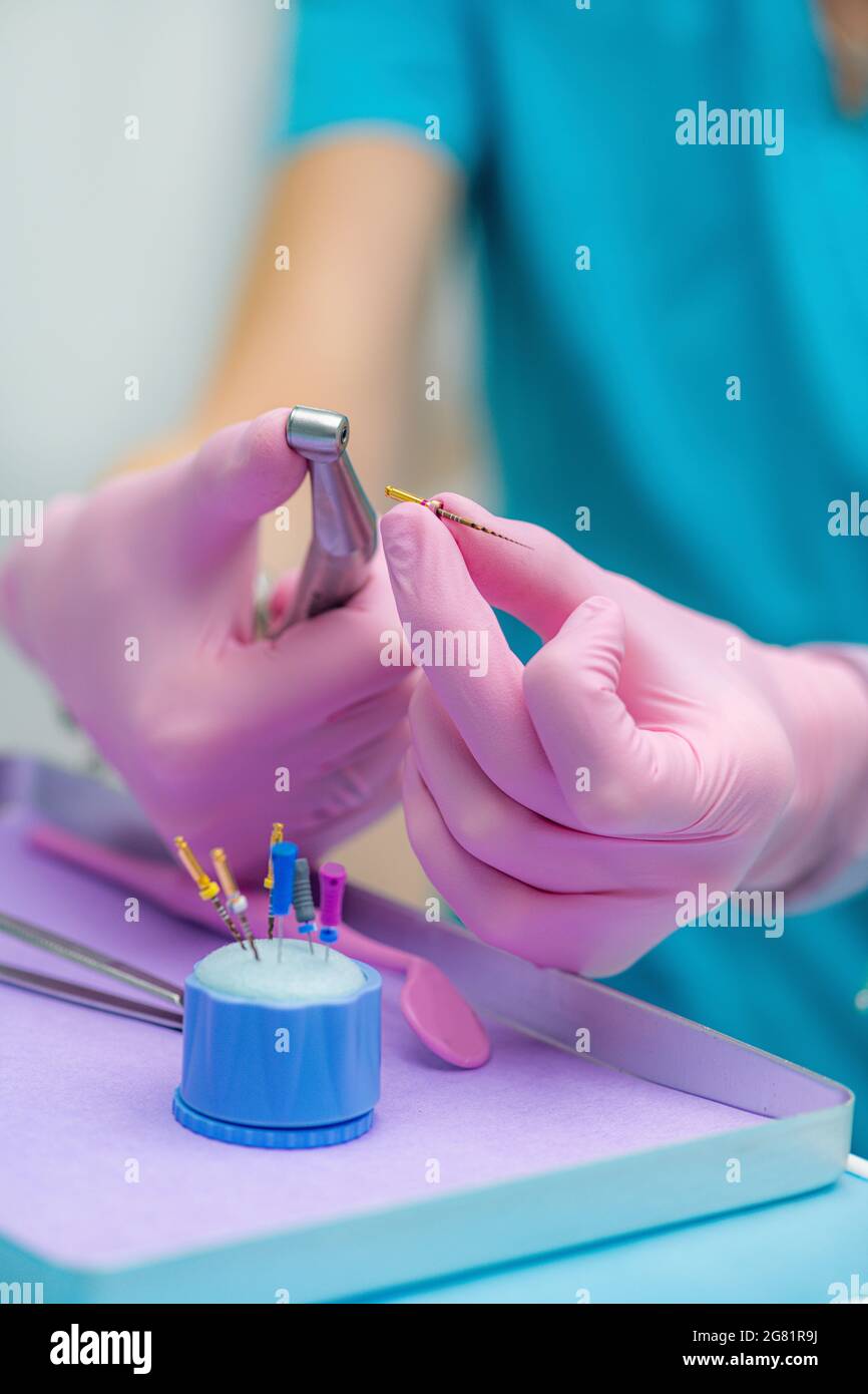 Endodontist with glidden drill Stock Photo