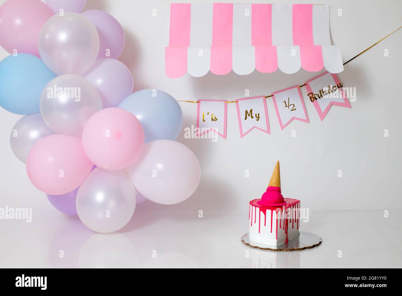 Party background with balloons, streamers and confetti on pastel blue  background. Birthday party decoration Stock Photo - Alamy
