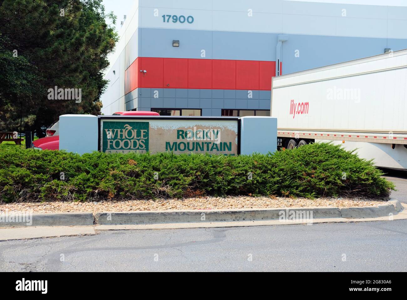 Exterior sign at the Whole Foods Rocky Mountain Distribution Center and bakehouse in Aurora, Colorado; grocery warehouse. Stock Photo