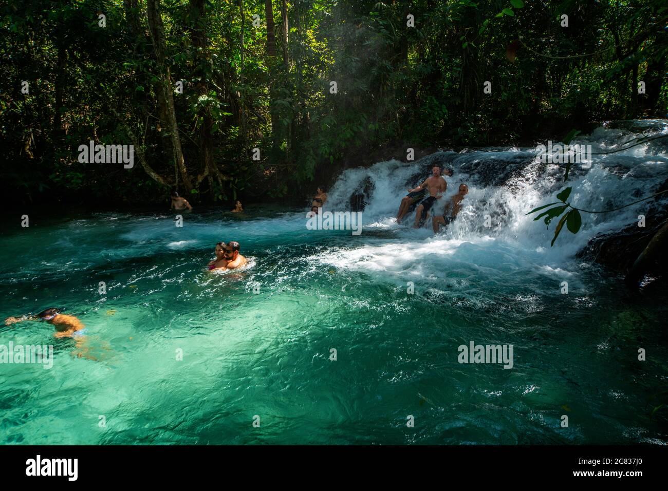 Tourists swimming at Cachoeira da Formiga, Jalapão, Tocantins, Brazil Stock Photo