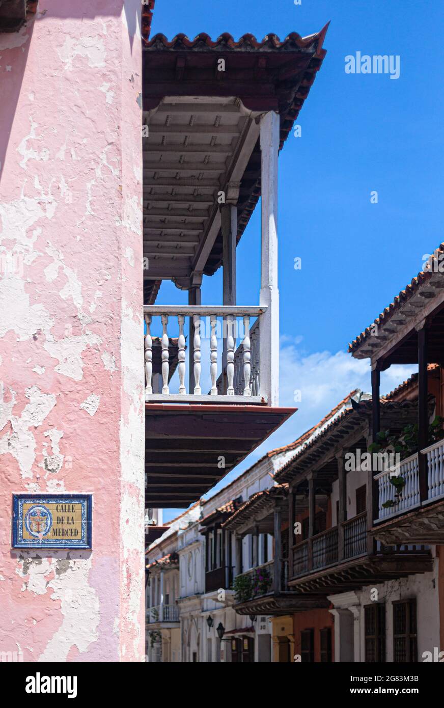 Old house balcony on a first floor, Cartagena de Indias, Colombia. Stock Photo