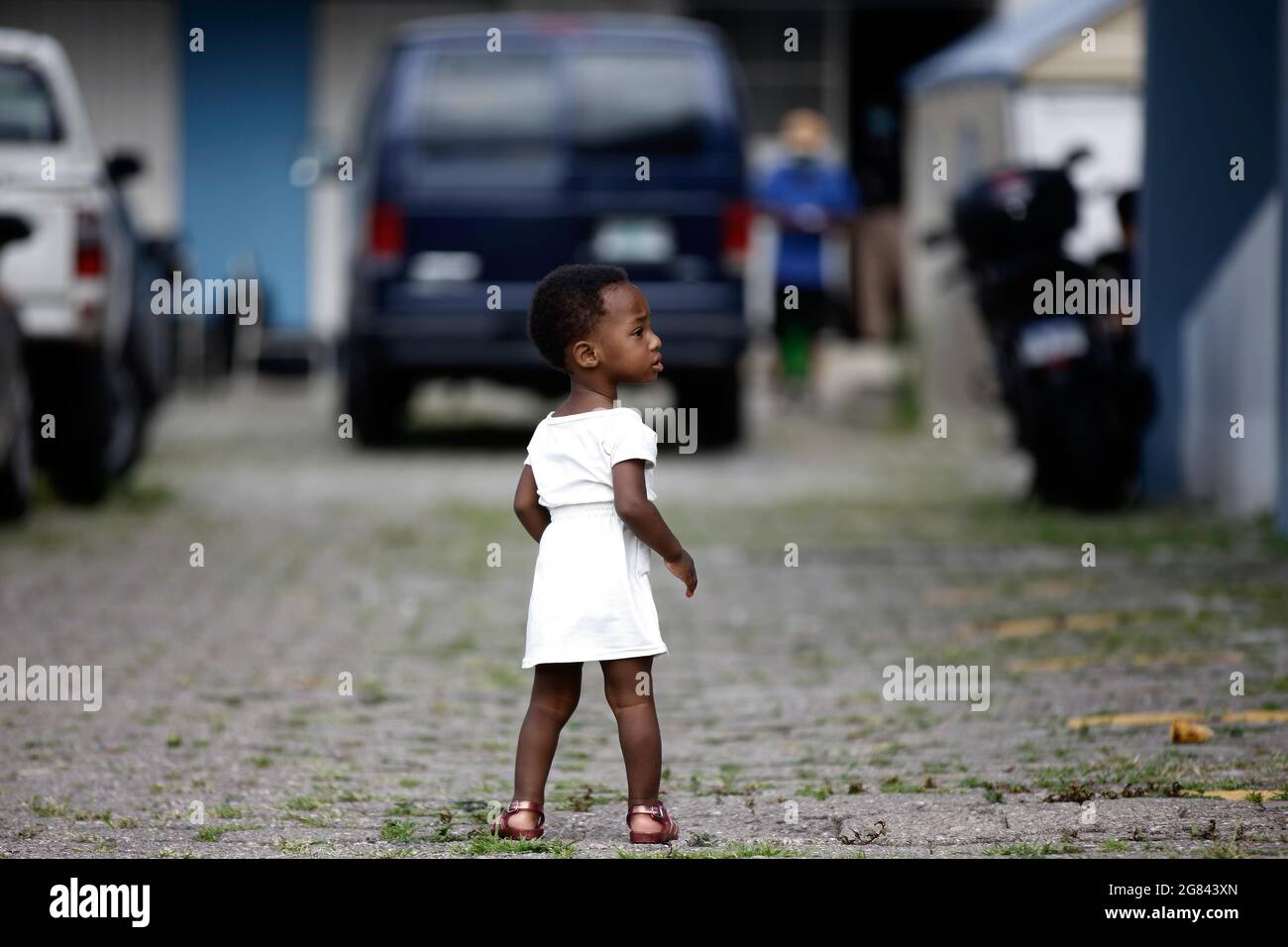 Tegucigalpa, Honduras. 16th July, 2021. A girl walks through the ...
