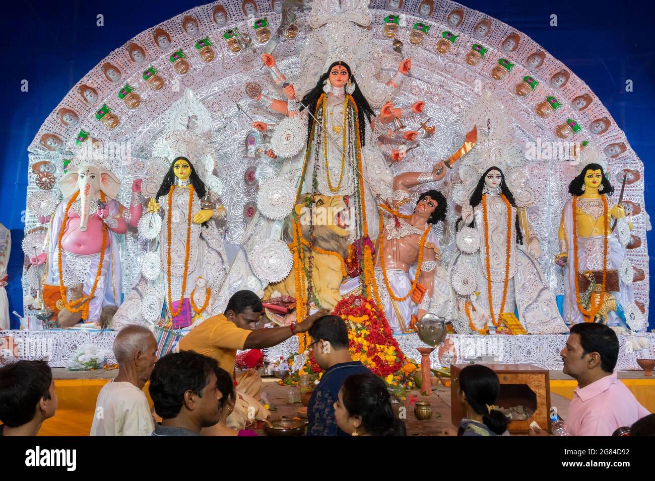 Kolkata, India October 18, 2018 Hindu priest blessing male devotee