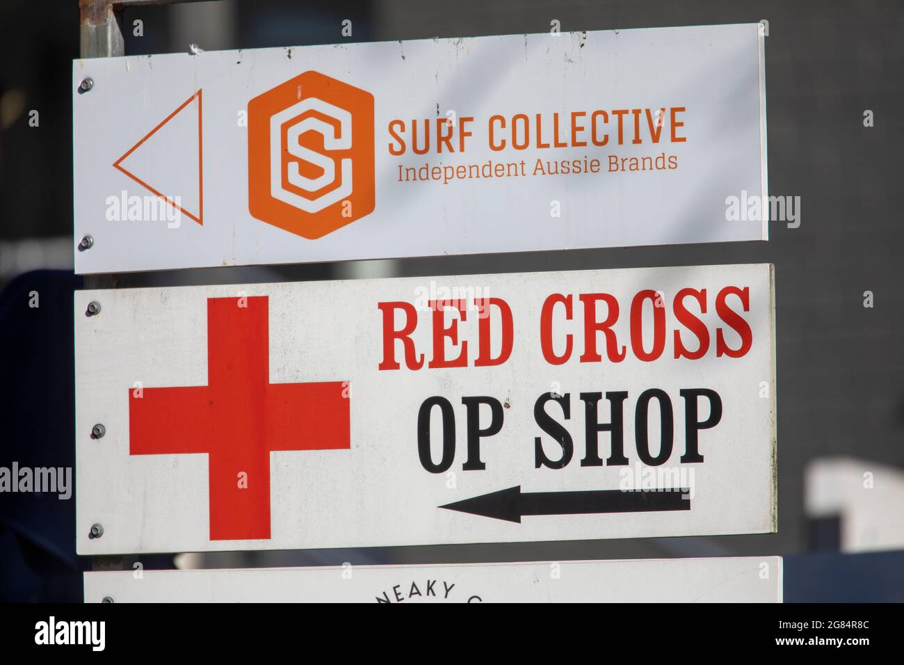 Australian red cross op shop charity store in Sydney with sign for