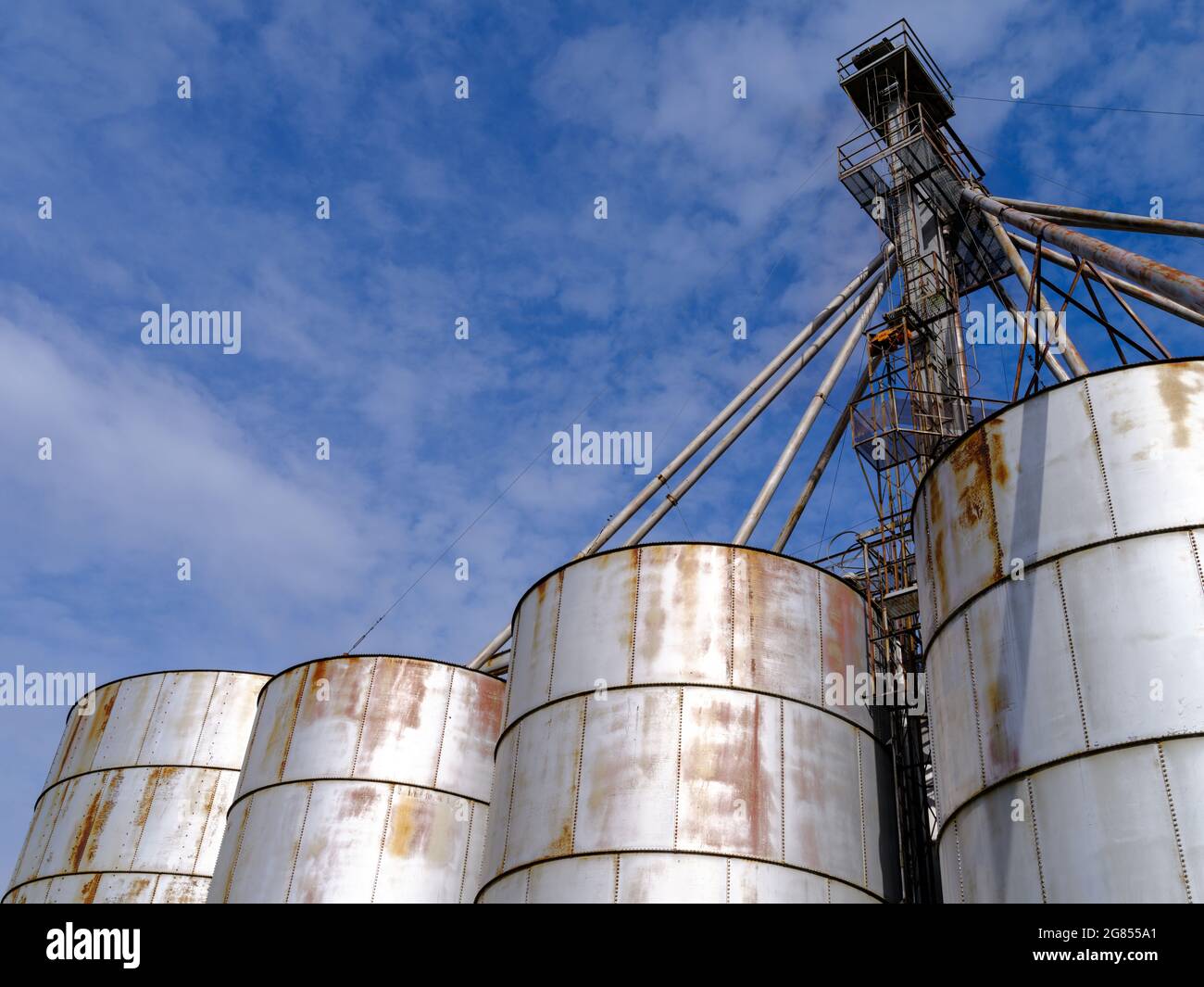 A grain distributor atop metal bins at a grain elevator in southeastern