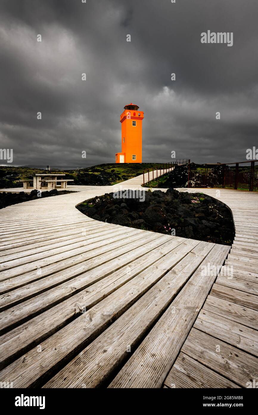 Typical icelandic orange lighthouse of Svörtuloft on Snaefellsnes Peninsula. Stock Photo