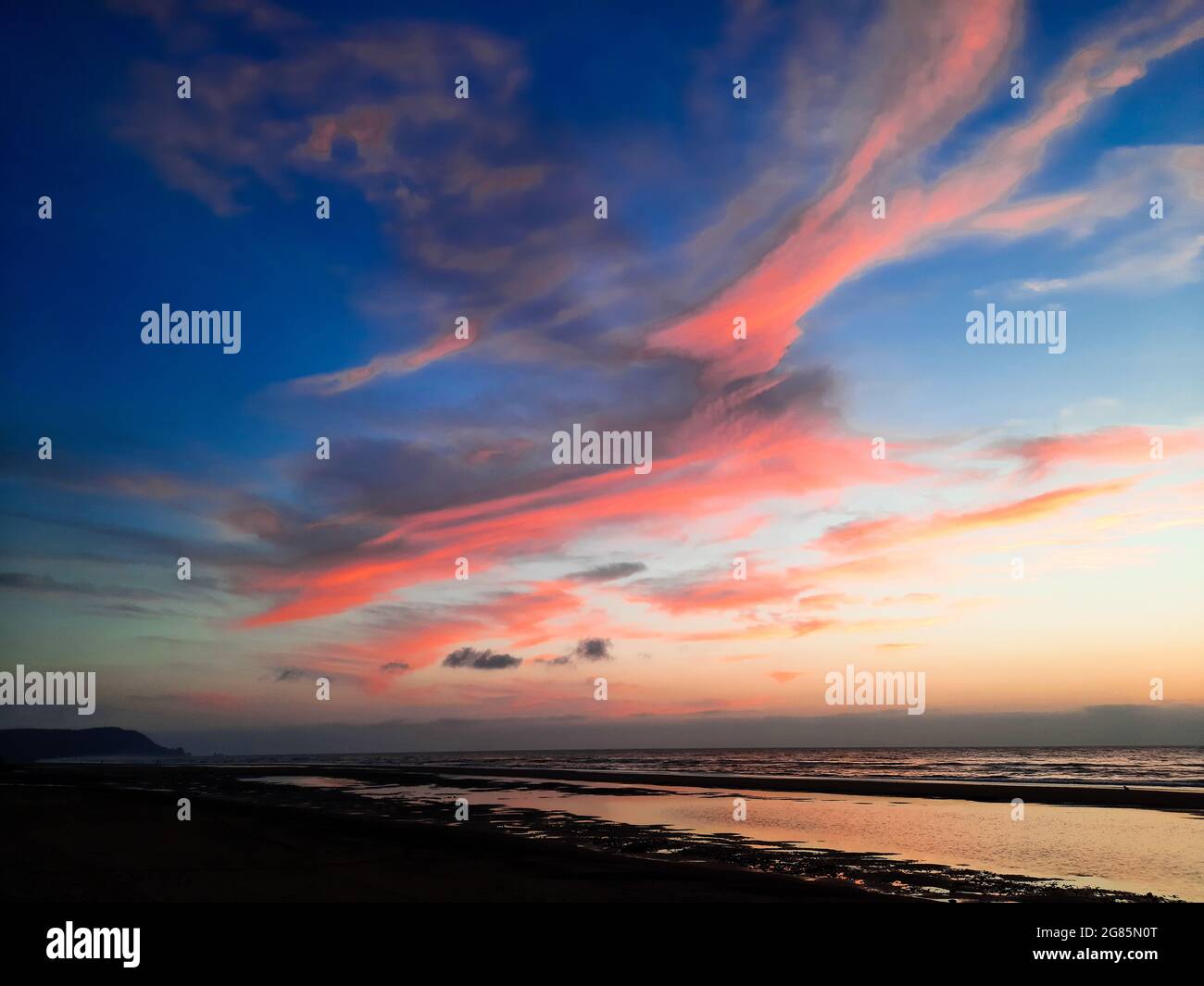 Sunset by the sea with beautiful sky Stock Photo - Alamy