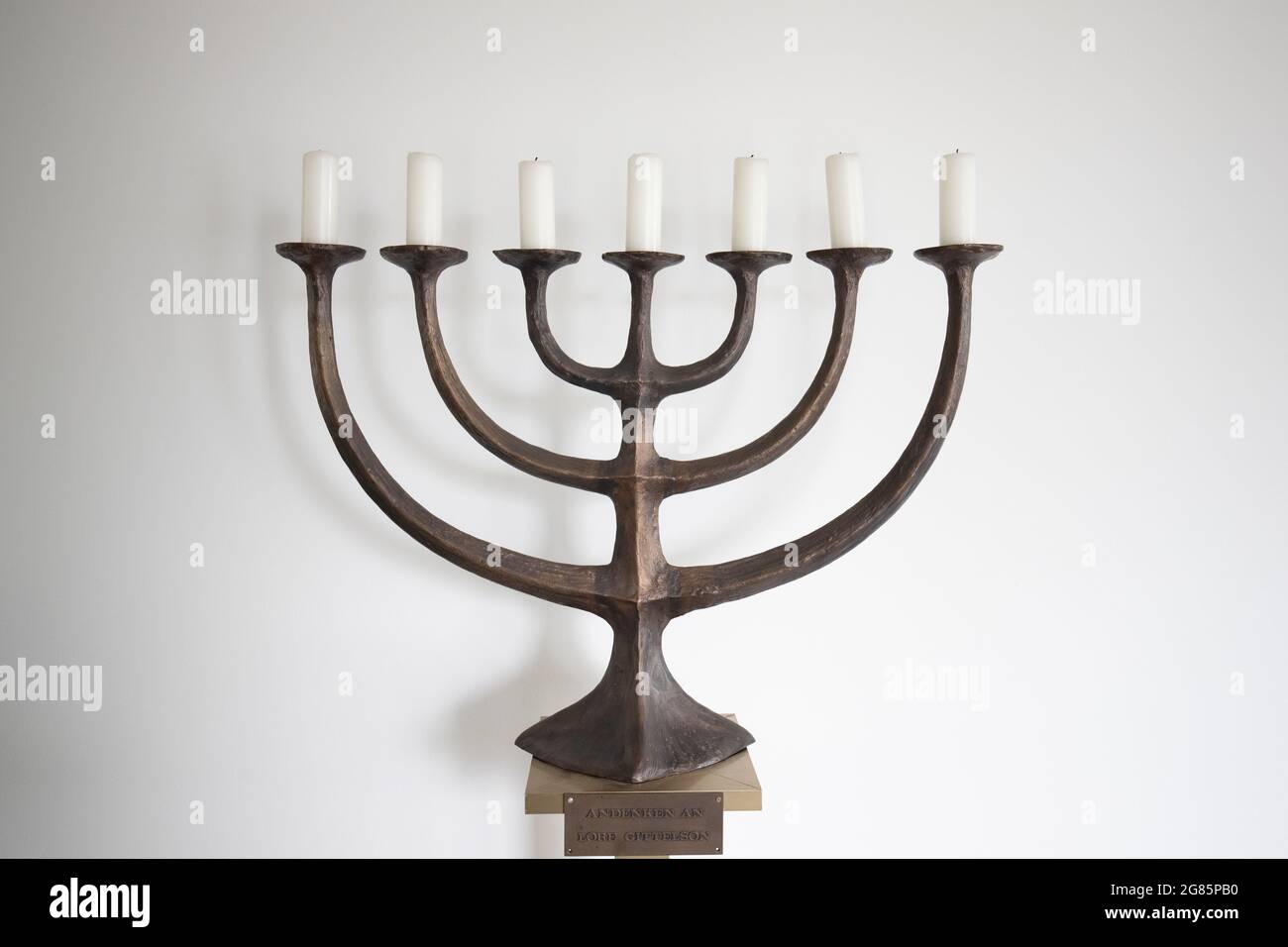 15 July 2021, Lower Saxony, Osnabrück: A seven-branched candelabrum stands in the synagogue of the Osnabrück Jewish Community. Photo: Friso Gentsch/dpa Stock Photo