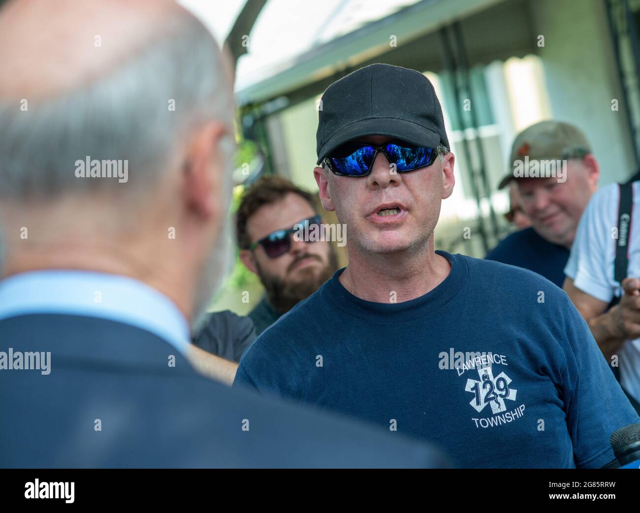 Bristol, USA. 16th July, 2021. Pennsylvania Governor Tom Wolf meets with residents whose homes were flooded this past week after 10 inches of rain fell on the area in a short period of time Friday, July 16, 2021 at Snowden Avenue in Bristol, Pennsylvania. ( Credit: William Thomas Cain/Alamy Live News Stock Photo