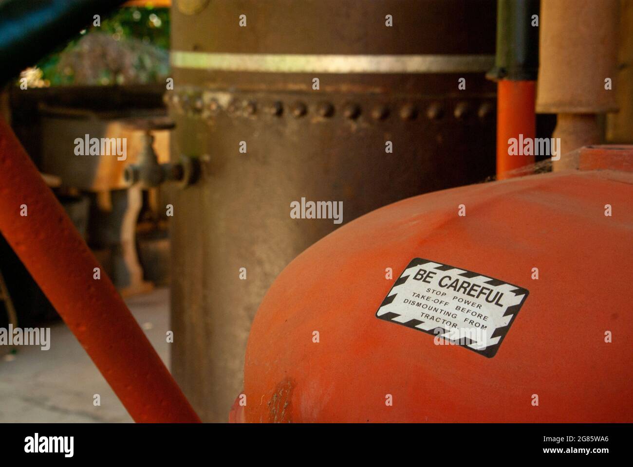 Warning Notice on Machinery Stock Photo - Alamy