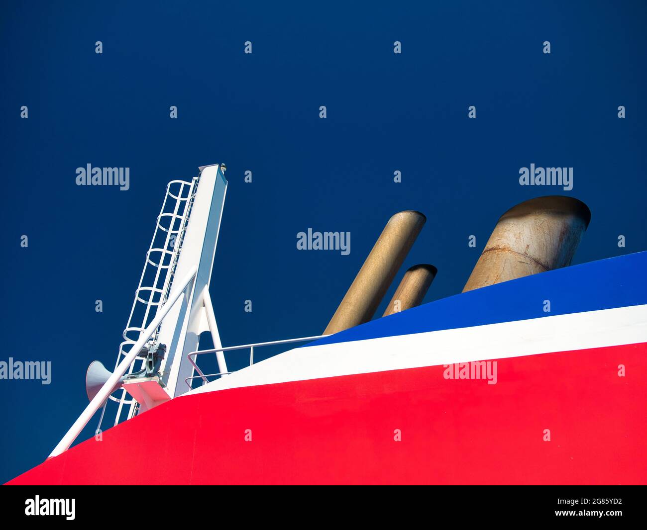 The red, white and blue corporate coloured superstructure of the Stena Line roll on roll off ferry operating in the Irish Sea between Birkenhead and B Stock Photo