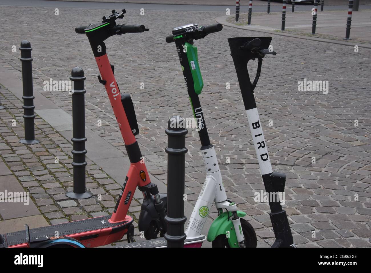 Cologne, Germany. 16th July, 2021. Rental e-scooters from Voi, Bird and  Lime are on the pavement Credit: Horst Galuschka/dpa/Alamy Live News Stock  Photo - Alamy