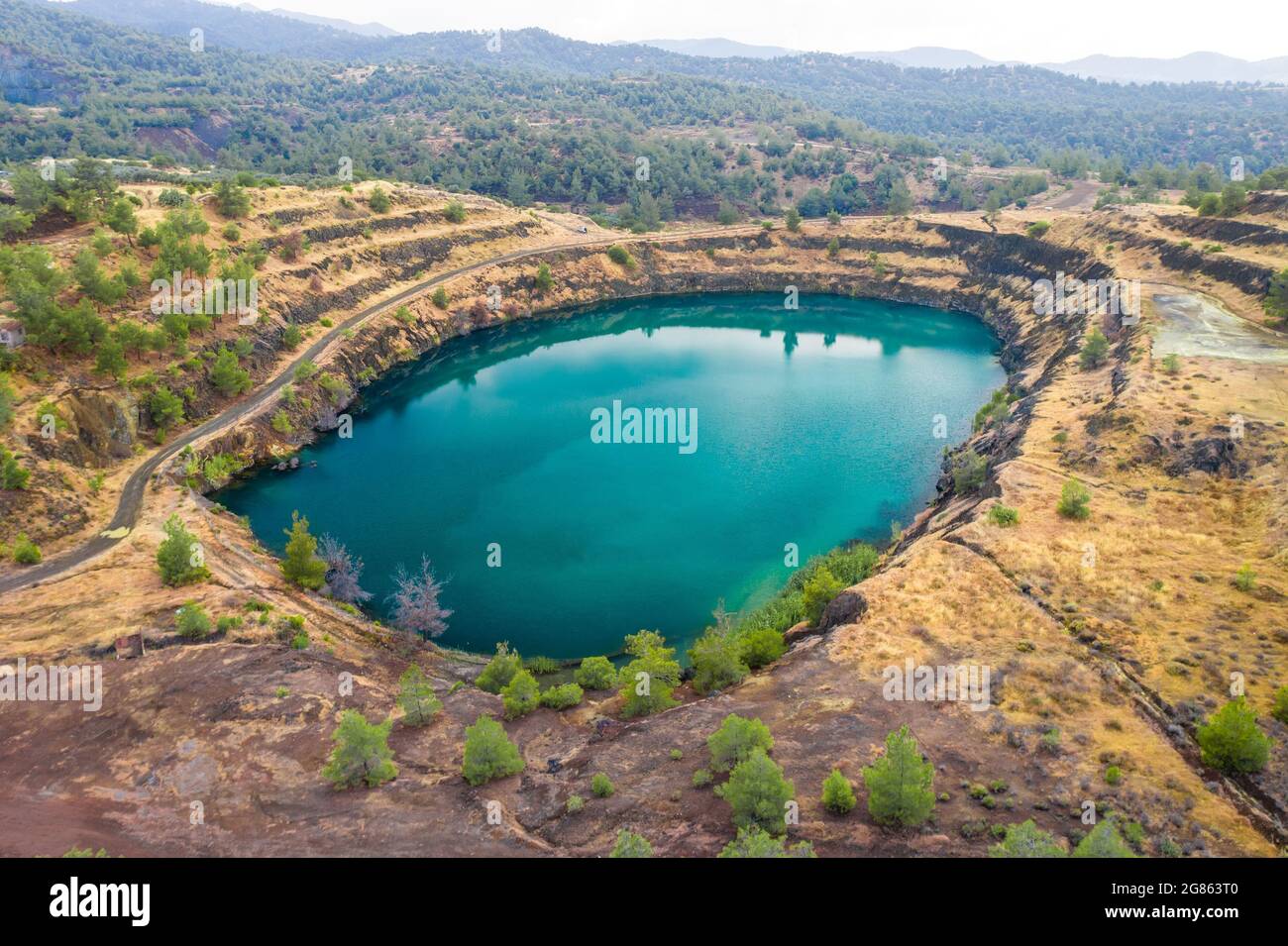Lake in abandoned open pit of Pythorachoma copper mine near Kapedes, Cyprus  Stock Photo - Alamy