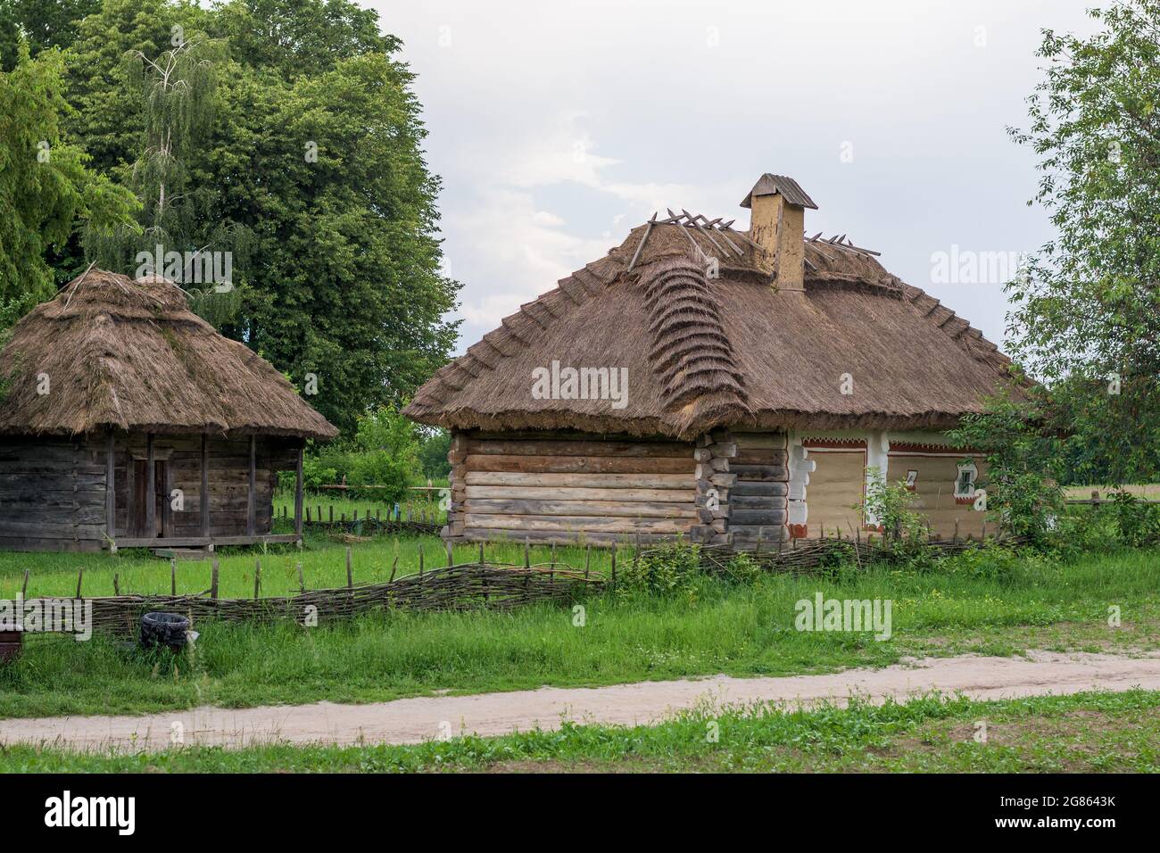 Village with traditional wooden houses on a sunny day Stock Photo - Alamy