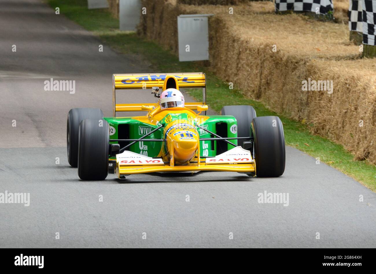 Benetton B192 Formula 1, Grand Prix car. Ex-Michael Schumacher Benetton  Cosworth racing up the hill climb at the Goodwood Festival of Speed 2013  Stock Photo - Alamy
