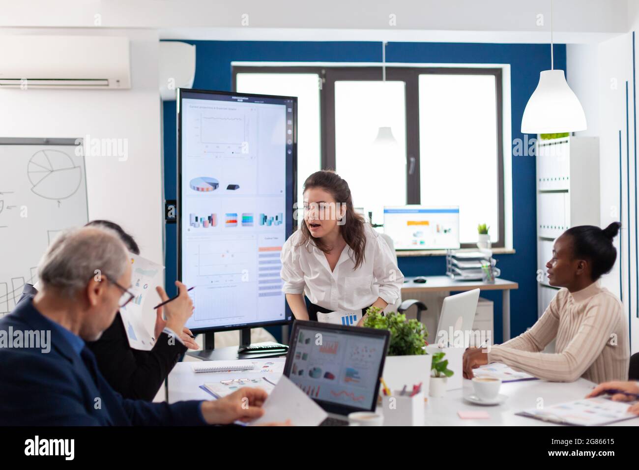 Angry manager screaming diverse employees hi-res stock photography and ...