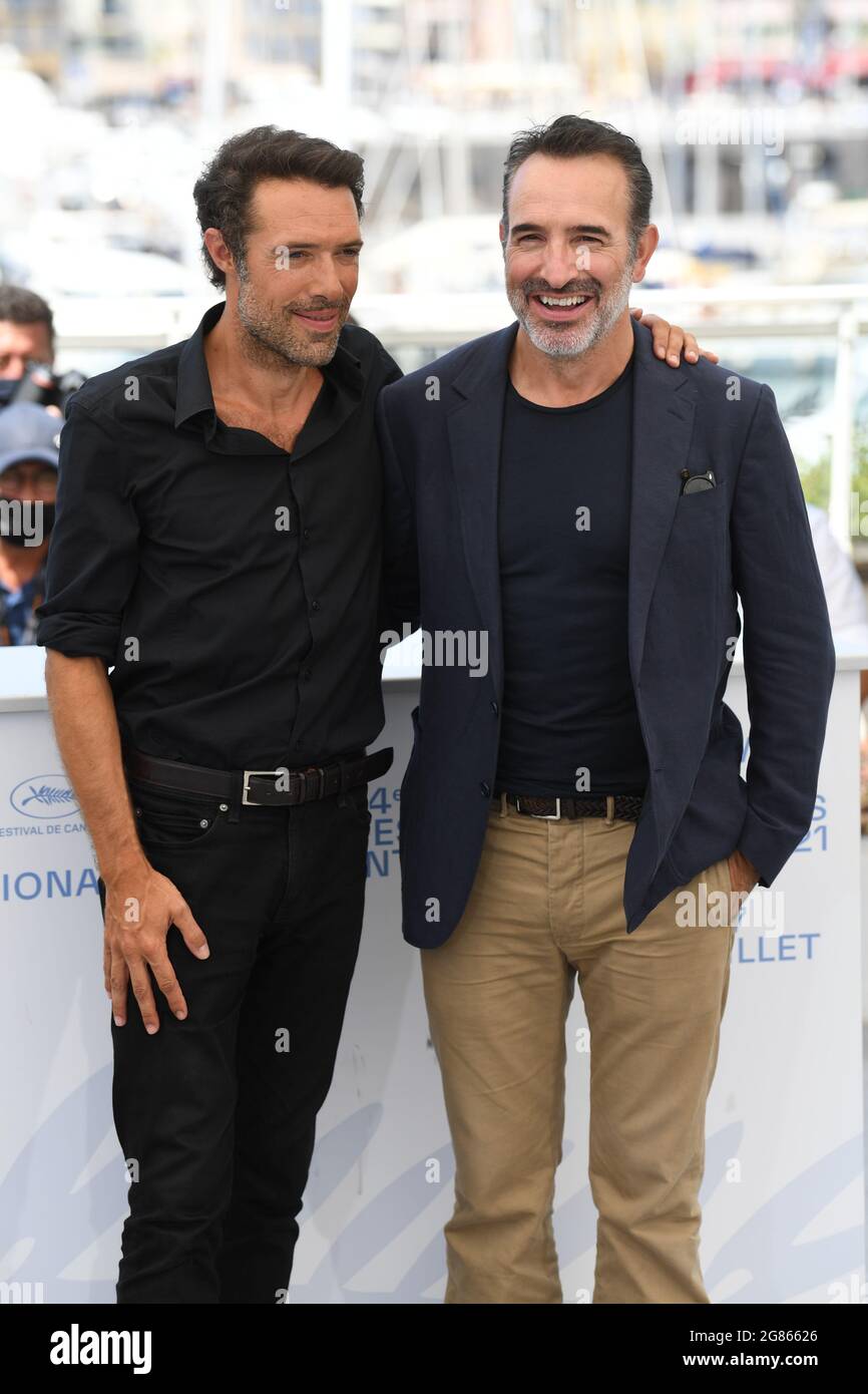 Cannes, France, 17 July 2021 Nicolas Bedos and Jean Dujardin at the  photocall for OSS 117: From Africa with Love, held at the Palais des  Festival. Part of the 74th Cannes Film